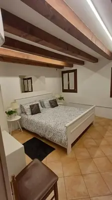 Letto o letti in una camera di Fiore della Laguna