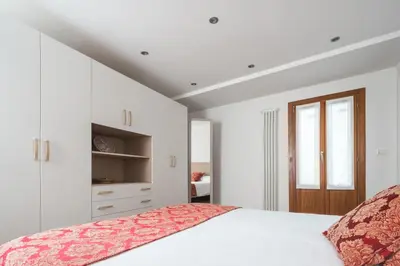 Letto o letti in una camera di Goodwind Venice Apartments