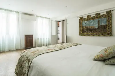 Letto o letti in una camera di Goodwind Venice Apartments