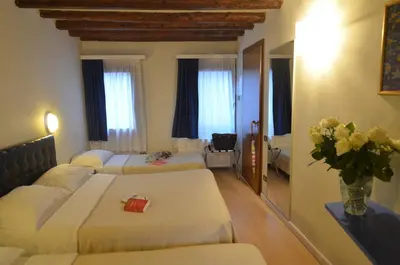 Letto o letti in una camera di Piccolo Tiepolo