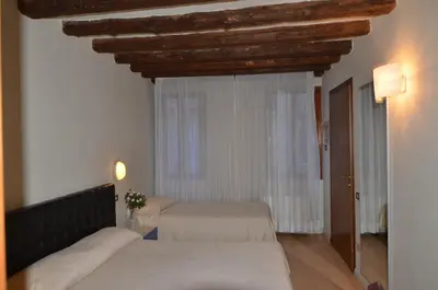 Letto o letti in una camera di Piccolo Tiepolo