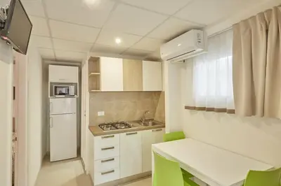 Cucina o angolo cottura di Village Camping Joker