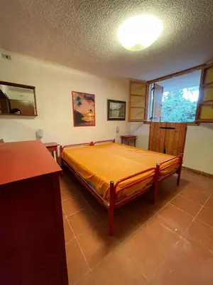 Letto o letti in una camera di VILLA CA' SILVA - WALTERIGATO Apartments SOLO PER FAMIGLIE