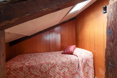 Letto o letti in una camera di Ca' Badoer Attic