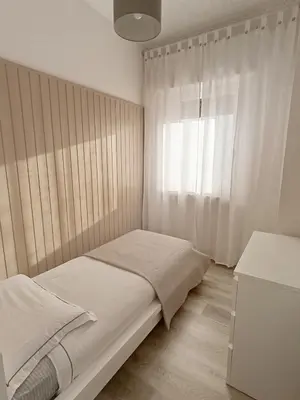 Letto o letti in una camera di Kasakiwi Apartment