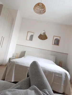 Letto o letti in una camera di Kasakiwi Apartment