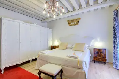 Letto o letti in una camera di MARCO Canal-views