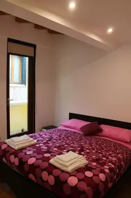 Letto o letti in una camera di Alessandra House