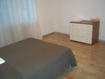 Letto o letti in una camera di Appartamento Gronda Lagunare