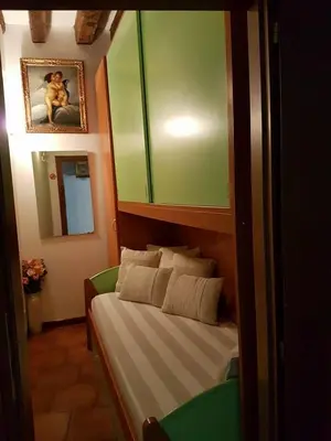 Letto o letti in una camera di Ca' Malatin