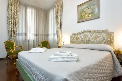 Letto o letti in una camera di Residenza Calle Larga San Marco