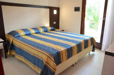Letto o letti in una camera di Delle Rose