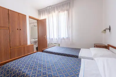 Letto o letti in una camera di Margherita Family Apartments