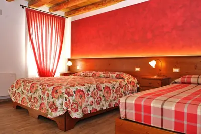Letto o letti in una camera di Al Filò