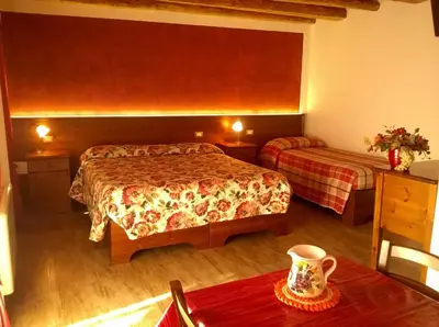 Letto o letti in una camera di Al Filò