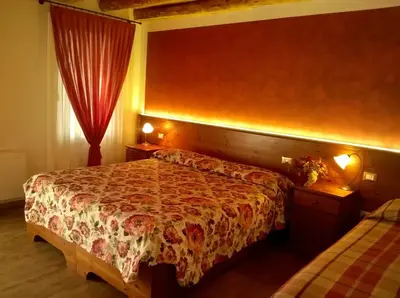 Letto o letti in una camera di Al Filò