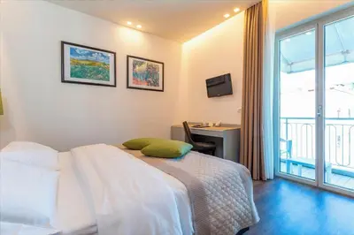 Letto o letti in una camera di Hotel Principe Palace