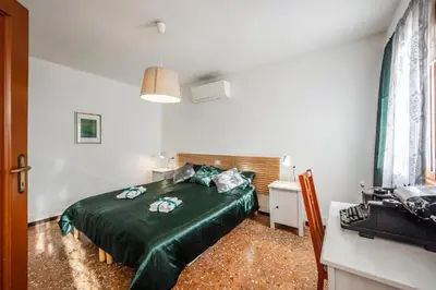 Letto o letti in una camera di Ca' Gallion 1144