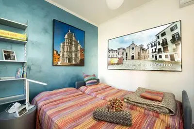 Letto o letti in una camera di La Terrazza di Vivaldi