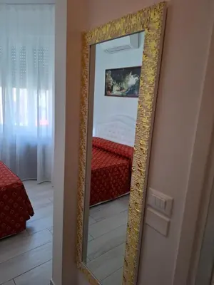 Letto o letti in una camera di Le Maschere