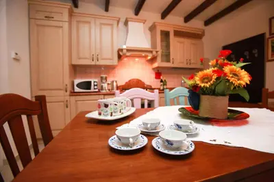 Cucina o angolo cottura di Two-Bedroom Apartment in Rosolina Mare 25037