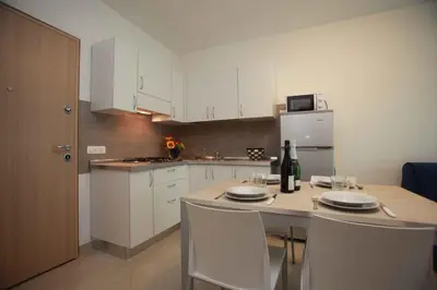 Cucina o angolo cottura di Apartments in Rosolina Mare 25008