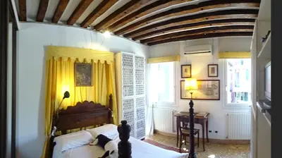 Letto o letti in una camera di Artist House