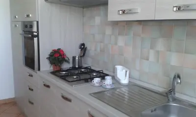 Cucina o angolo cottura di Locazione Turistica alle Tre Civette