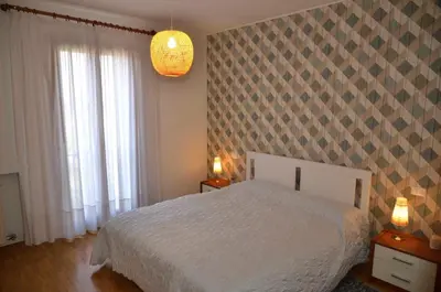 Letto o letti in una camera di Montello Apartment a pochi passi dal centro