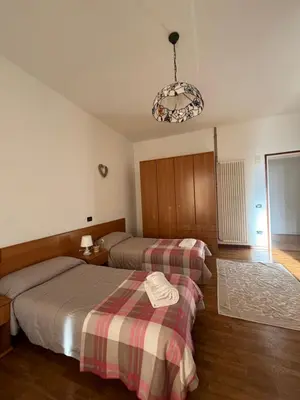 Letto o letti in una camera di Locanda Caffe Sport