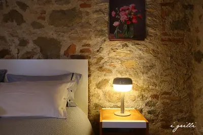 Letto o letti in una camera di I grilli b&b
