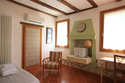 Letto o letti in una camera di I grilli b&b