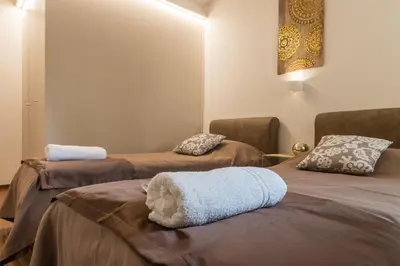 Letto o letti in una camera di La Loggia Al Duomo - Treviso