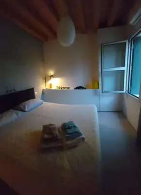 Letto o letti in una camera di Cinquelune Apartment