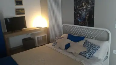 Letto o letti in una camera di Cinquelune Apartment