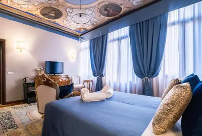 Letto o letti in una camera di Ca' Lavezzera