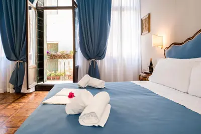 Letto o letti in una camera di Ca' Lavezzera