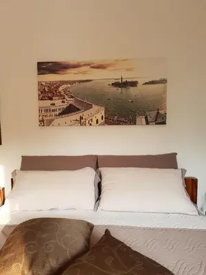 Letto o letti in una camera di Appartamento Angelo Emo