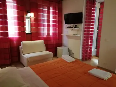 Letto o letti in una camera di San Marco Romantic Views