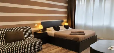 Letto o letti in una camera di Bsuites Scrovegni