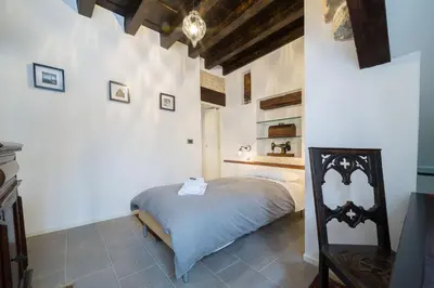 Letto o letti in una camera di VeNICe Cera Casa Santo Stefano