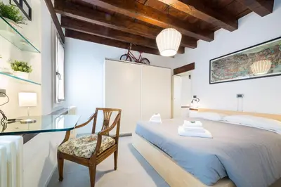 Letto o letti in una camera di VeNICe Cera Casa Santo Stefano