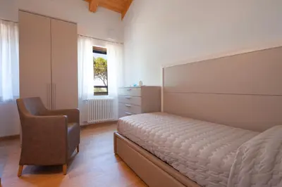Letto o letti in una camera di Cà Del Pioppo