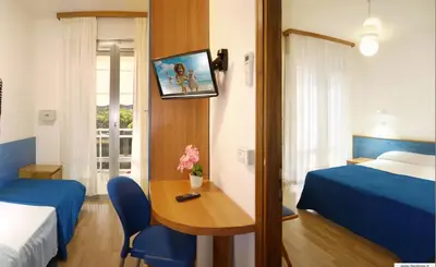 Letto o letti in una camera di Hotel Bertha Fronte Mare