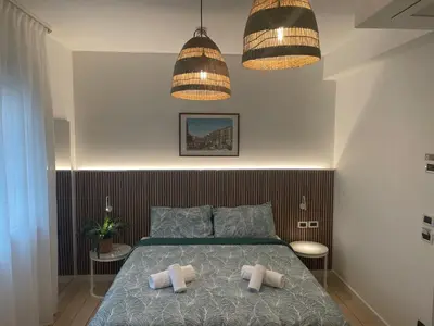 Letto o letti in una camera di Hotel La Pergola di Venezia