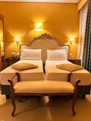 Letto o letti in una camera di Hotel Corte Contarina
