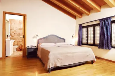 Letto o letti in una camera di Al Gallo Nero