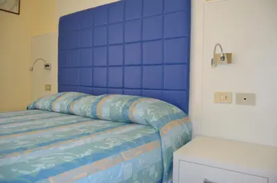 Letto o letti in una camera di Park Hotel Perù ***S