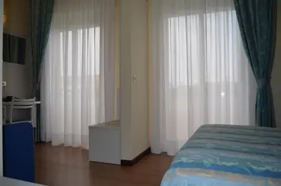 Letto o letti in una camera di Park Hotel Perù ***S