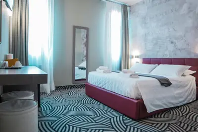 Letto o letti in una camera di Hotel Cannaregio 2357